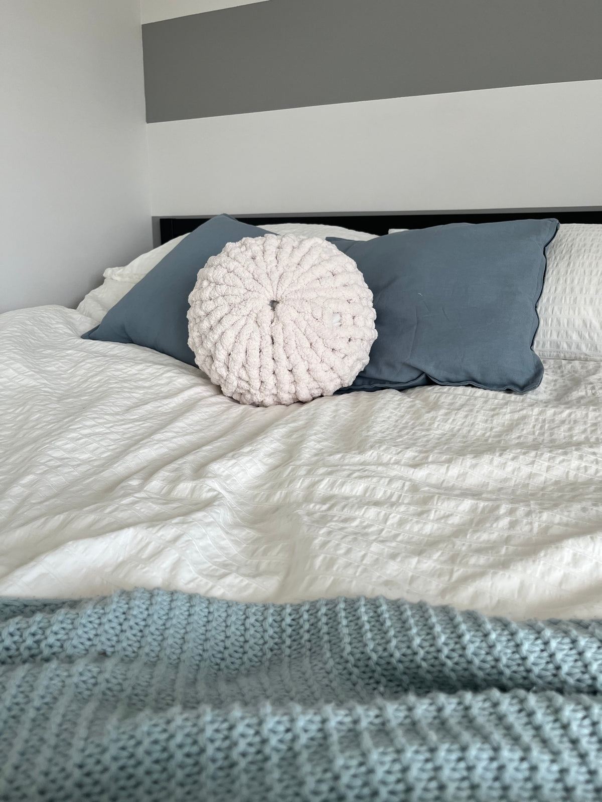 One colour circular knitted pillow